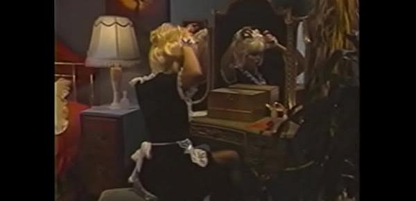  Curious blonde maid  Sharon Kane was going looking through her mistress&039;  private things when robber in the mask (Sharon Mitchell) appeared and pressured her into  spreading her legs for muff diving; tensions ran high when houseowner  came to the roo